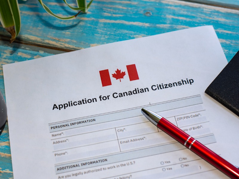Illustrative photograph showing showing concept of filling Canadian citizenship form