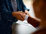 Close up of a handshake