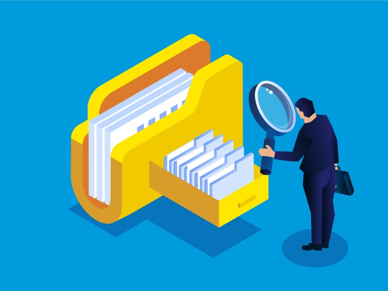 Illustration of a businessperson using a magnifying glass to examine files