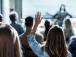 A creative woman asking a question at the office