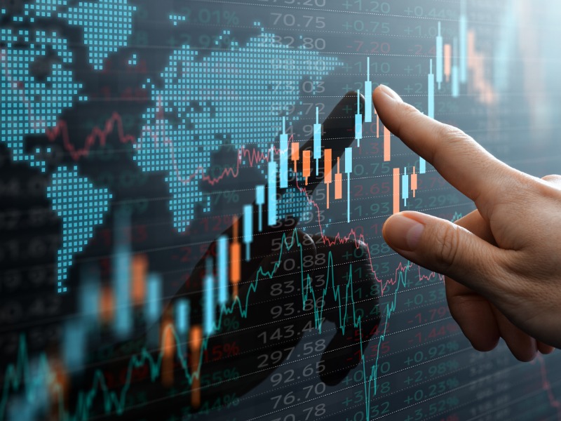 candlestick chart and finger